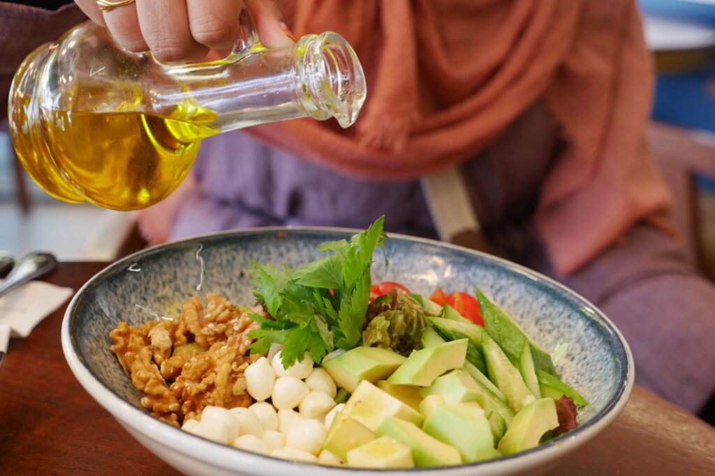 7 Science-Backed Foods That Help Reduce Inflammation Naturally (2) Mediterranean diet with extra virgin olive oil and fresh vegetables
