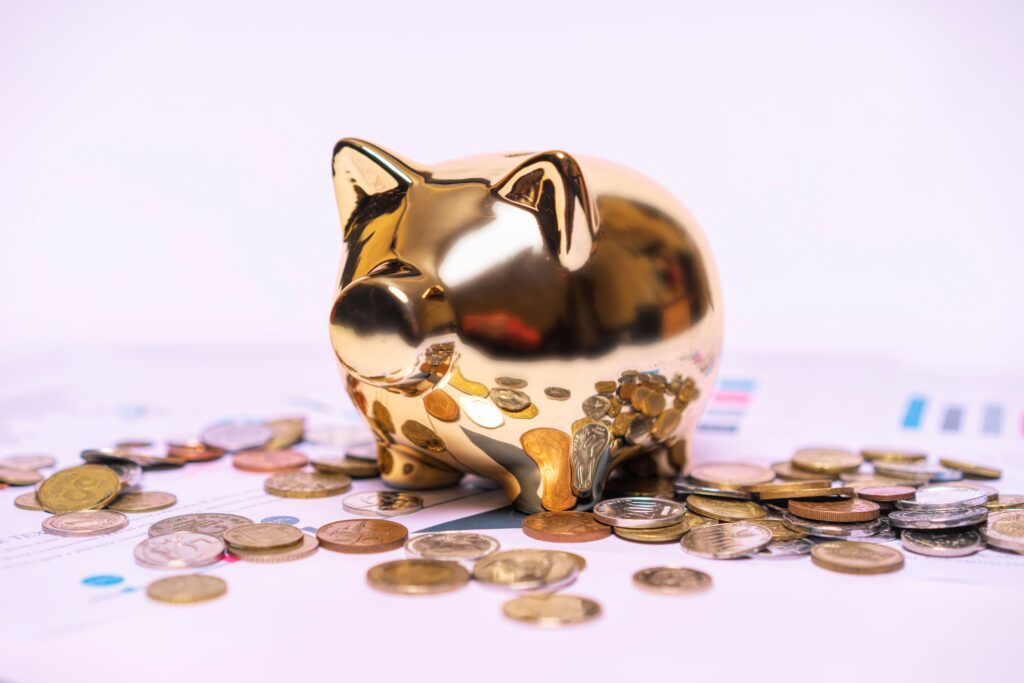 7 Smart Ways to Save Money Every Month Without Sacrificing Your Lifestyle (4) money in a piggy bank